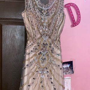 Dress size 4 fully beaded with great material